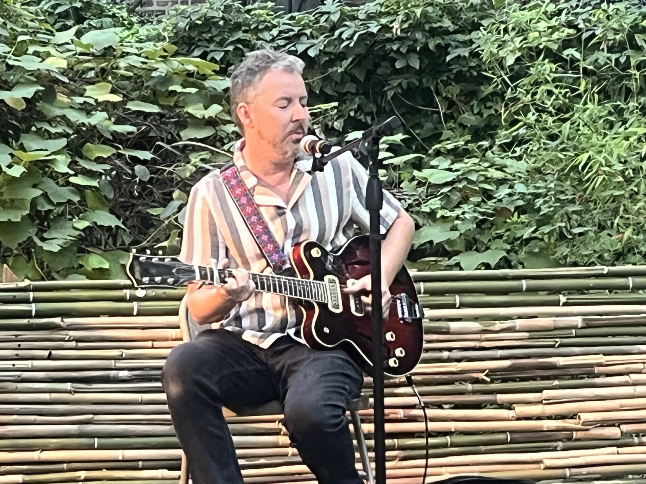 Matthieu Eveillard performing French ballads at a past Harvest Arts Festival.